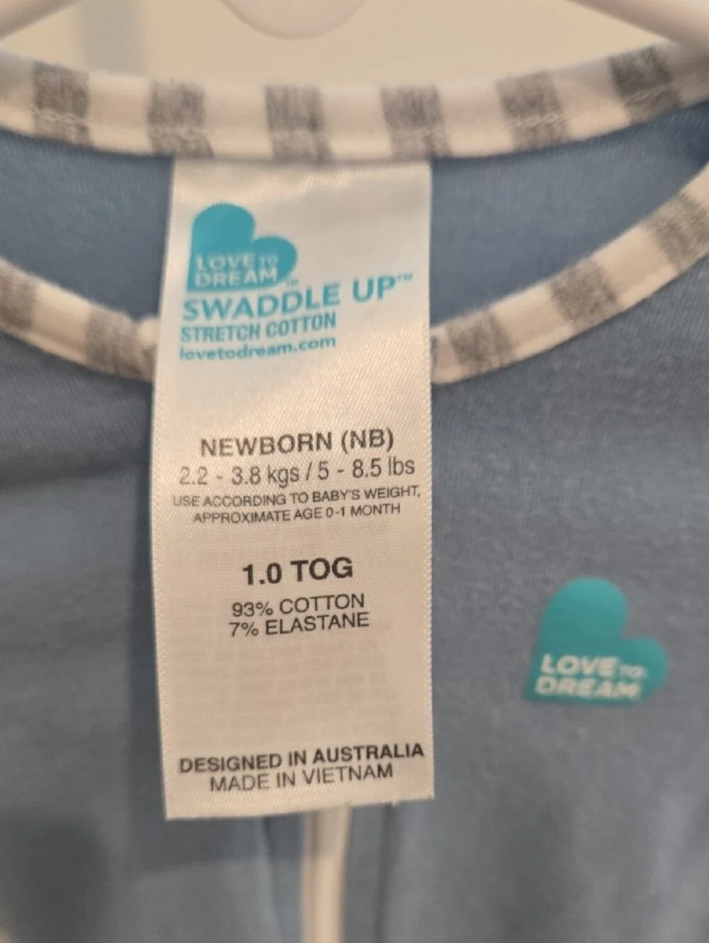 Love to dream Light Blue Swaddle One-Piece with Striped Trim